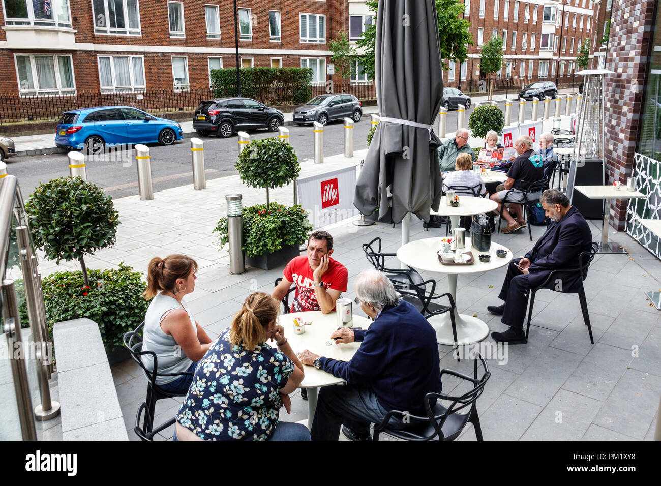 London England,UK,South Bank,Park Plaza Waterloo,hotel,illy Caffe,Italian cafe,coffee shop,al fresco,sidewalk outside tables dining street cafe,outsid Stock Photo