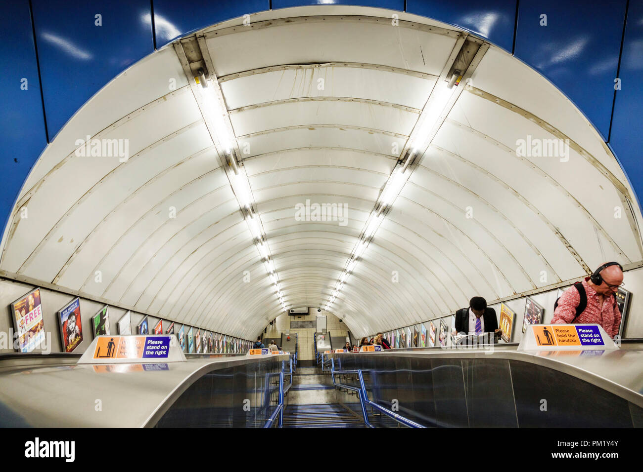 London England,UK,Charing Cross Underground Station train Tube subway tube,inside interior,escalator,man men male,UK GB English Europe,UK180815029 Stock Photo