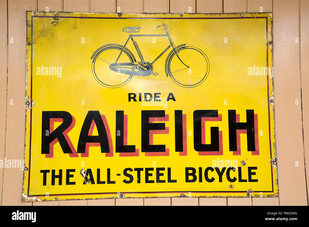 yellow raleigh bike