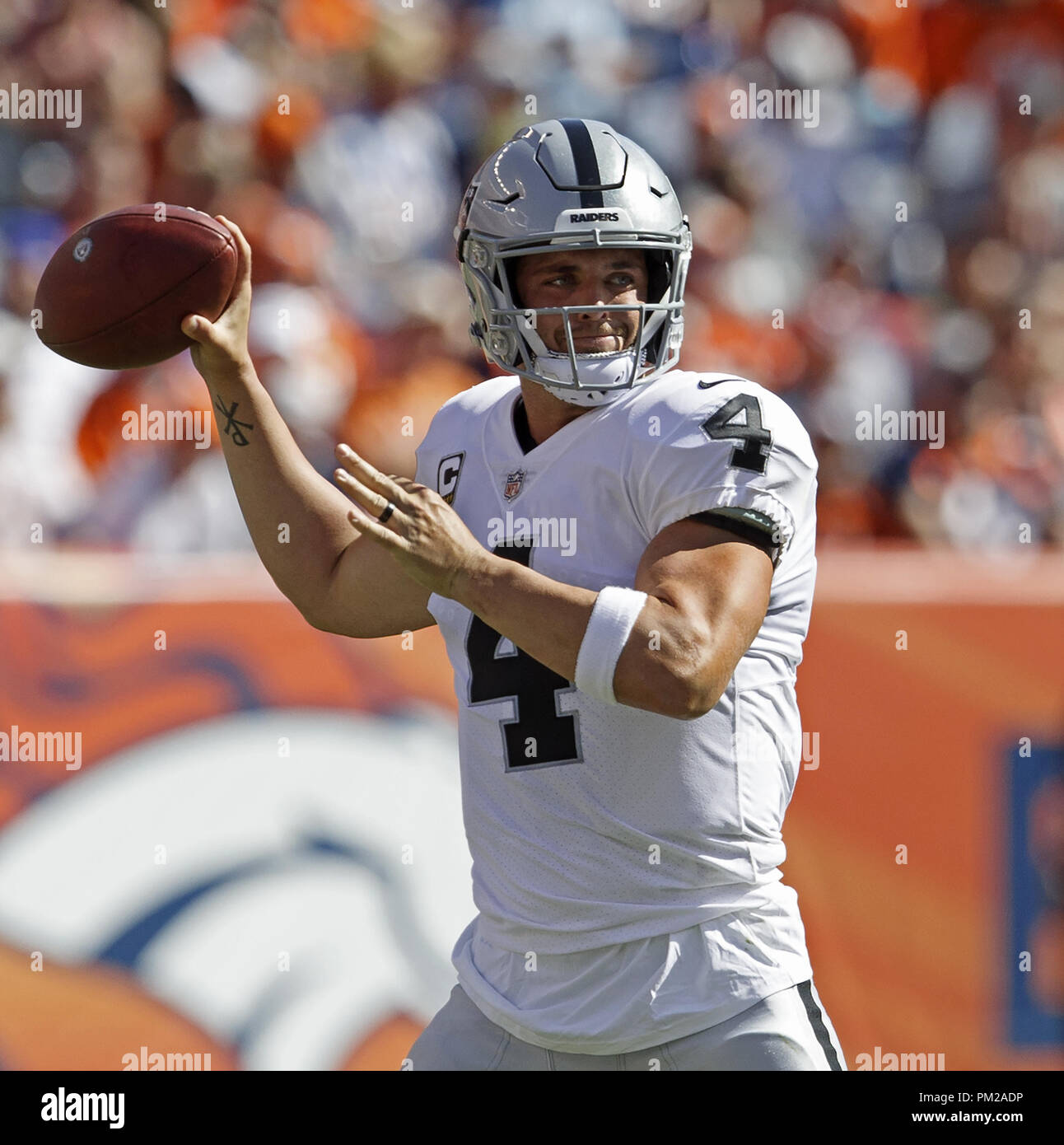 Denver, Colorado, USA. 16th Sep, 2018. Raiders QB DEREK CARR readies to throw a pass during the 1st. Half at Broncos Stadium at Mile High Sunday afternoon. The Broncos beat the Raiders 20-19. Credit: Hector Acevedo/ZUMA Wire/Alamy Live News Stock Photo