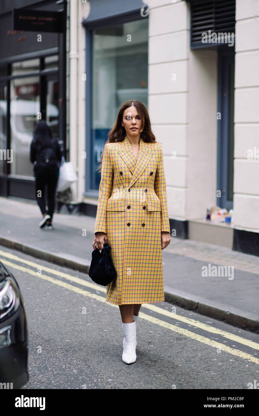 Evangelie Smyrniotaki posing outside the Victoria Beckham runway show