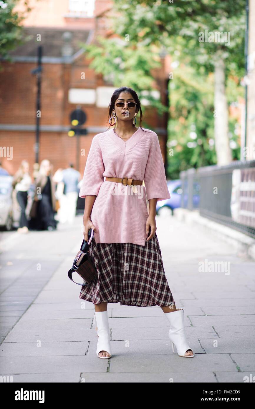 A chic showgoer posing outside the Preen by Thornton Bregazzi runway show during London Fashion Week - Sept 16, 2018 - Photo: Runway Manhattan ***For Editorial Use Only*** | usage worldwide Stock Photo