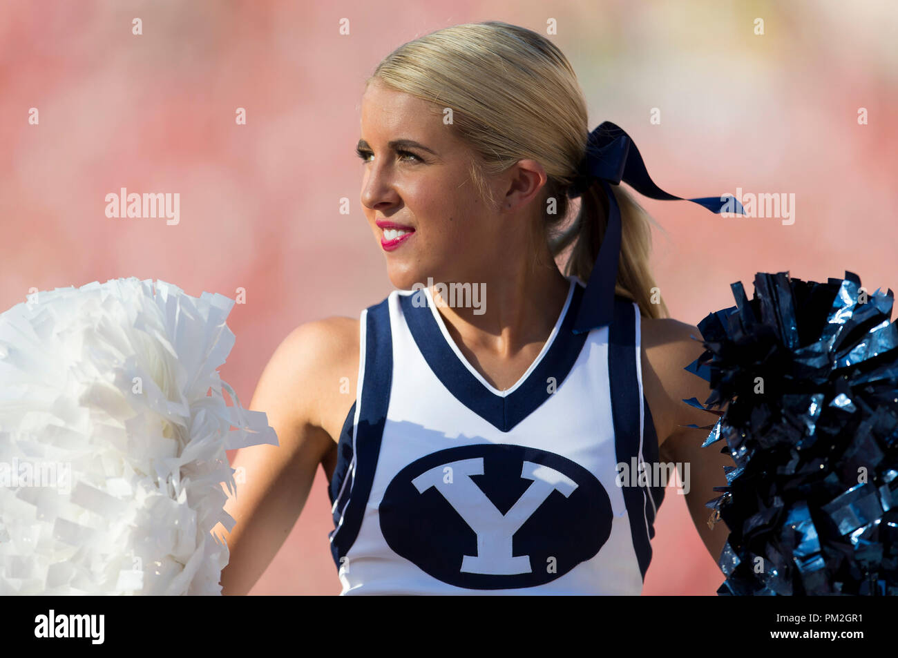 Madison, WI, USA. 15th Sep, 2018. Brigham Young cheerleaders joins the Badger cheerleaders and fans during ''Jump Around'' at the end of the 3rd quarter during the NCAA Football game between the Brigham Young Cougars and the Wisconsin Badgers at Camp Randall Stadium in Madison, WI. John Fisher/CSM/Alamy Live News Stock Photo