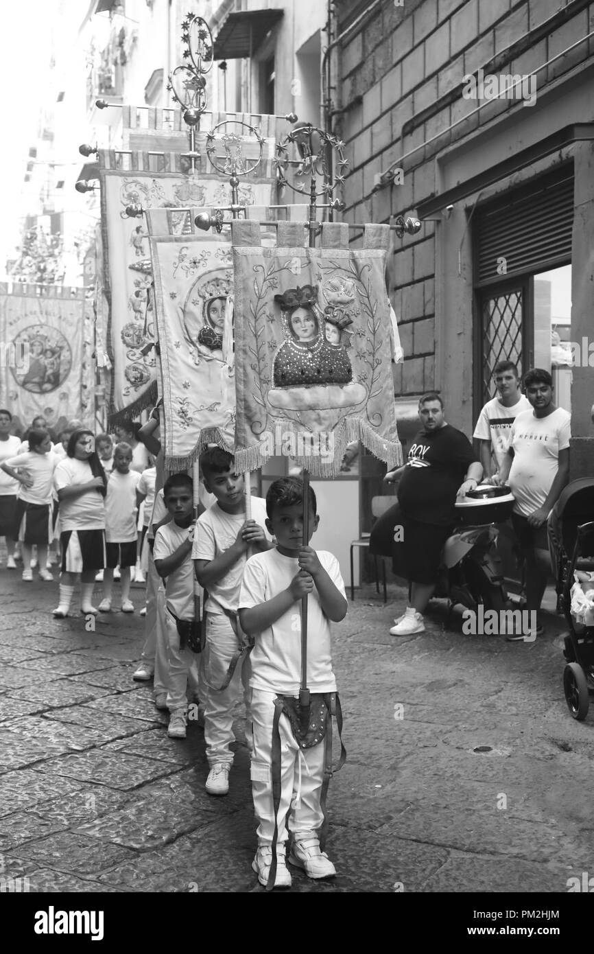 September 12, 2018 - On the occasion of Santa Maria a napoli in the Spanish quarters adjacent to the busy via toledo, the concreche of the Madonna dell'Arco have the custom of going out for the neighborhood and making rituals in honor of the Madonna.This adult function is attended by adult children under the watchful eye of the local towns very devoted to the Madonna. Credit: Fabio Sasso/ZUMA Wire/Alamy Live News Stock Photo