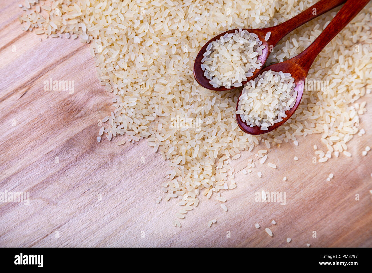 Long-grain steamed rice and two spoons Stock Photo - Alamy
