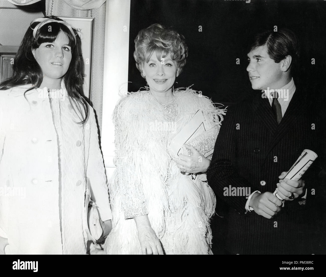 Lucille Ball with her daughter Lucy Arnaz and her son Desi Arnaz Jr. at the premiere of,  'Thoroughly Modern Millie', April 1967.   File Reference # 1238 001THA © JRC /The Hollywood Archive - All Rights Reserved Stock Photo