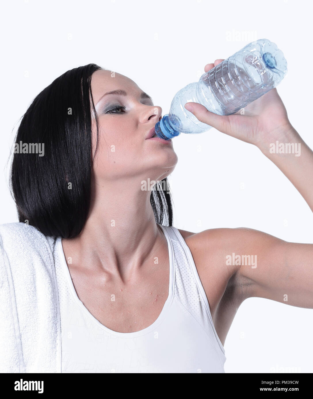 Sporting girl drinking water during exercise Stock Photo Alamy