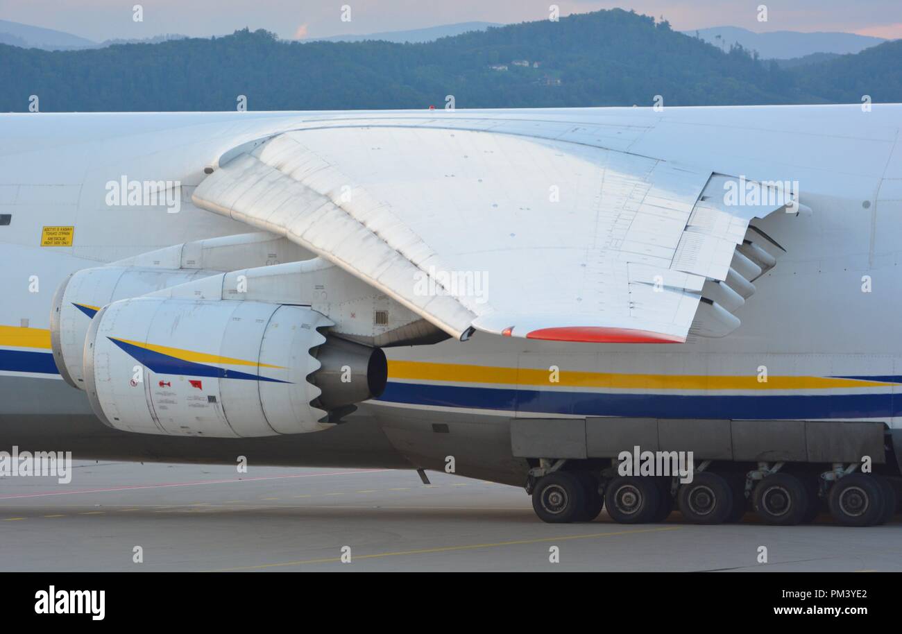 Extended flaps and slats of an Antonov 124 from Antonov Desgin Bureau including chevrons on its engines Stock Photo