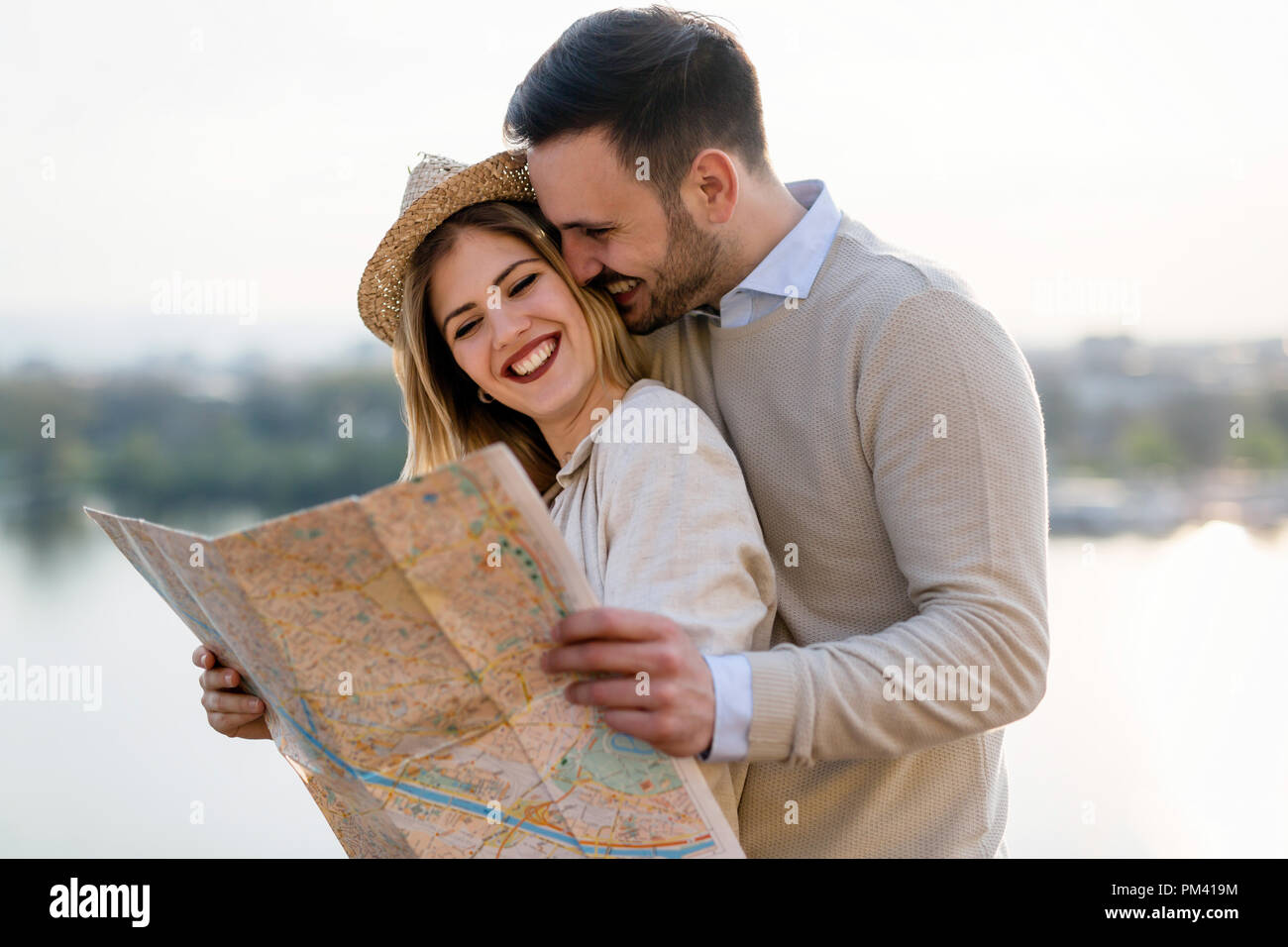 Beautiful tourist couple in love traveling and sightseeing Stock Photo