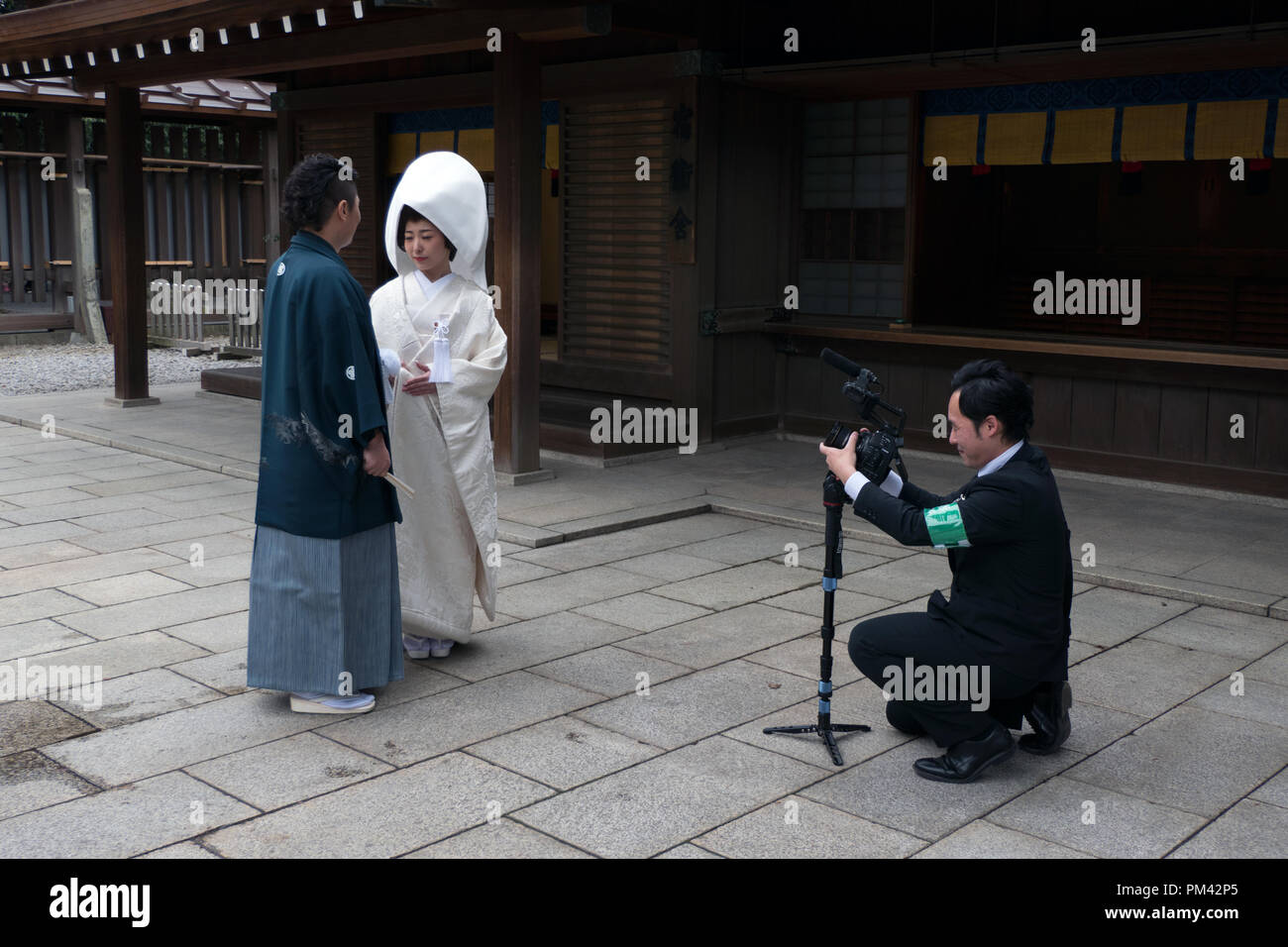 Photo shoot of a traditional Japanese wedding ceremony with bride and groom at Meiji Jingu Shrine in Tokyo, Japan, Asia Stock Photo