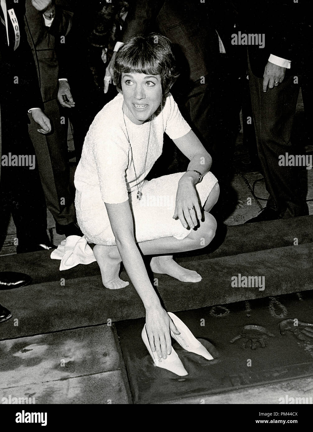 Julie Andrews placing her footprints in cement at Graumann's Chinese  Theatre on March 26,1966. File Reference #1021 002THA © JRC /The Hollywood  Archive - All Rights Reserved Stock Photo - Alamy