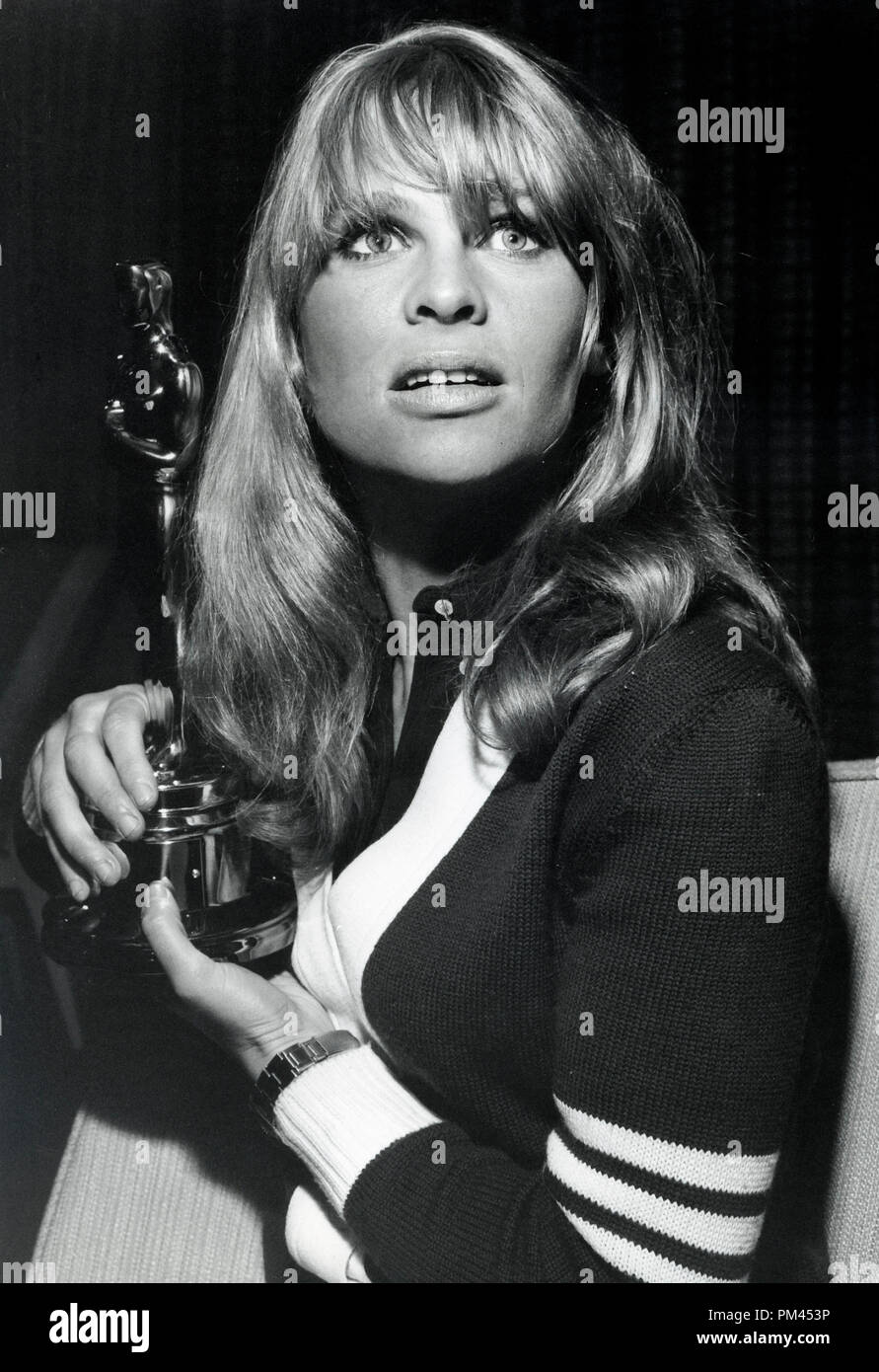 Julie Christie shows off her Oscar for her performance in 
