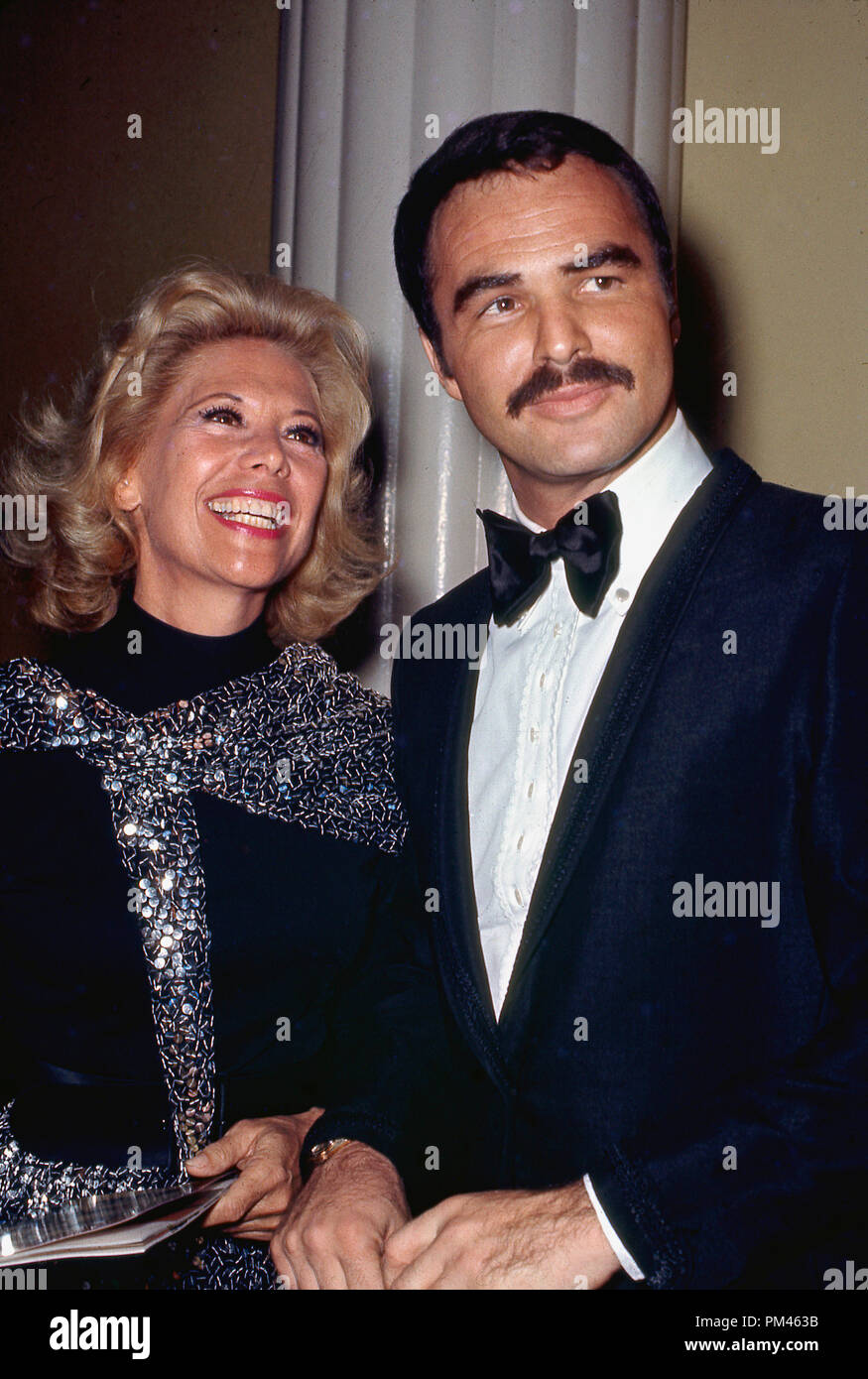 Burt Reynolds and Dinah Shore, circa 1971. File Reference #1052 015THA © JRC /The Hollywood Archive - All Rights Reserved. Stock Photo