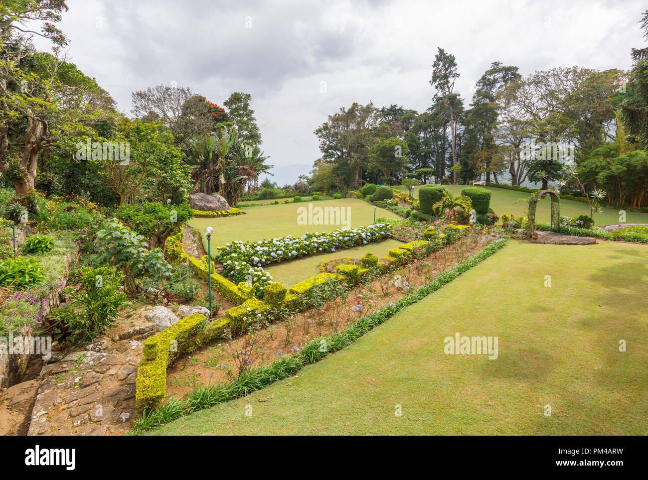 Dambatenne Group, Lipton's Bungalow (General Manager;s Building) landscaped gardens, Haputale hill country tea growing region, Uva District, Sri Lanka Stock Photo