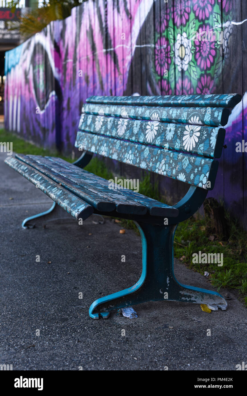 Colorful Bench On The Street With Graffiti On The Background Stock Photo Alamy