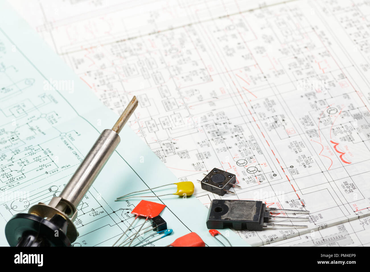 Soldering iron with electronics components on a scheme Stock Photo Alamy