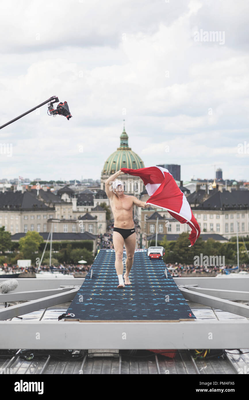 Denmark, Copenhagen - August 25, 2018. The cliff diving world draws all the attention to 27m platform on the cantilever roof of the Opera House during the Bull Cliff