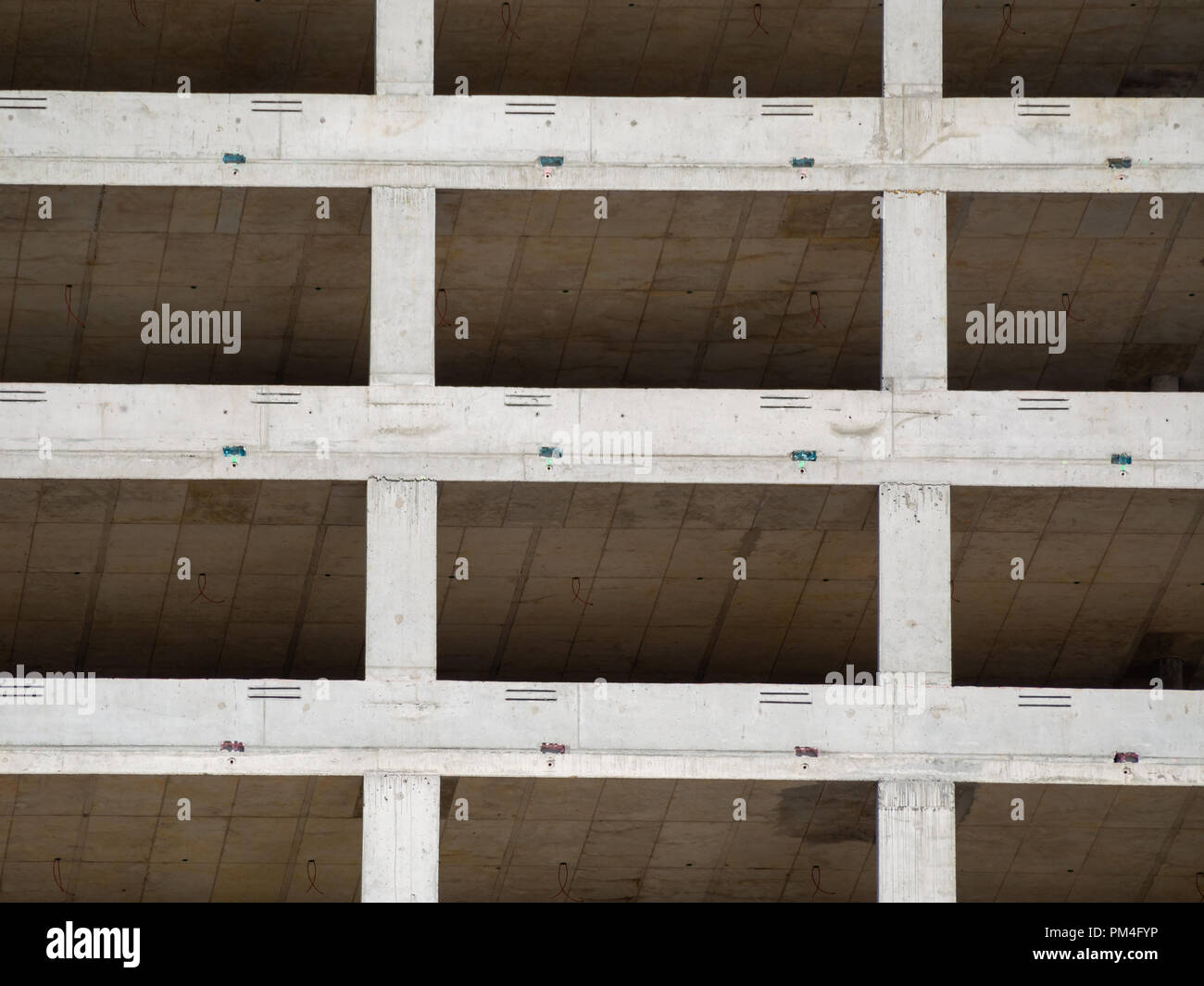 View at several floors of shell construction from below at day. Stock Photo