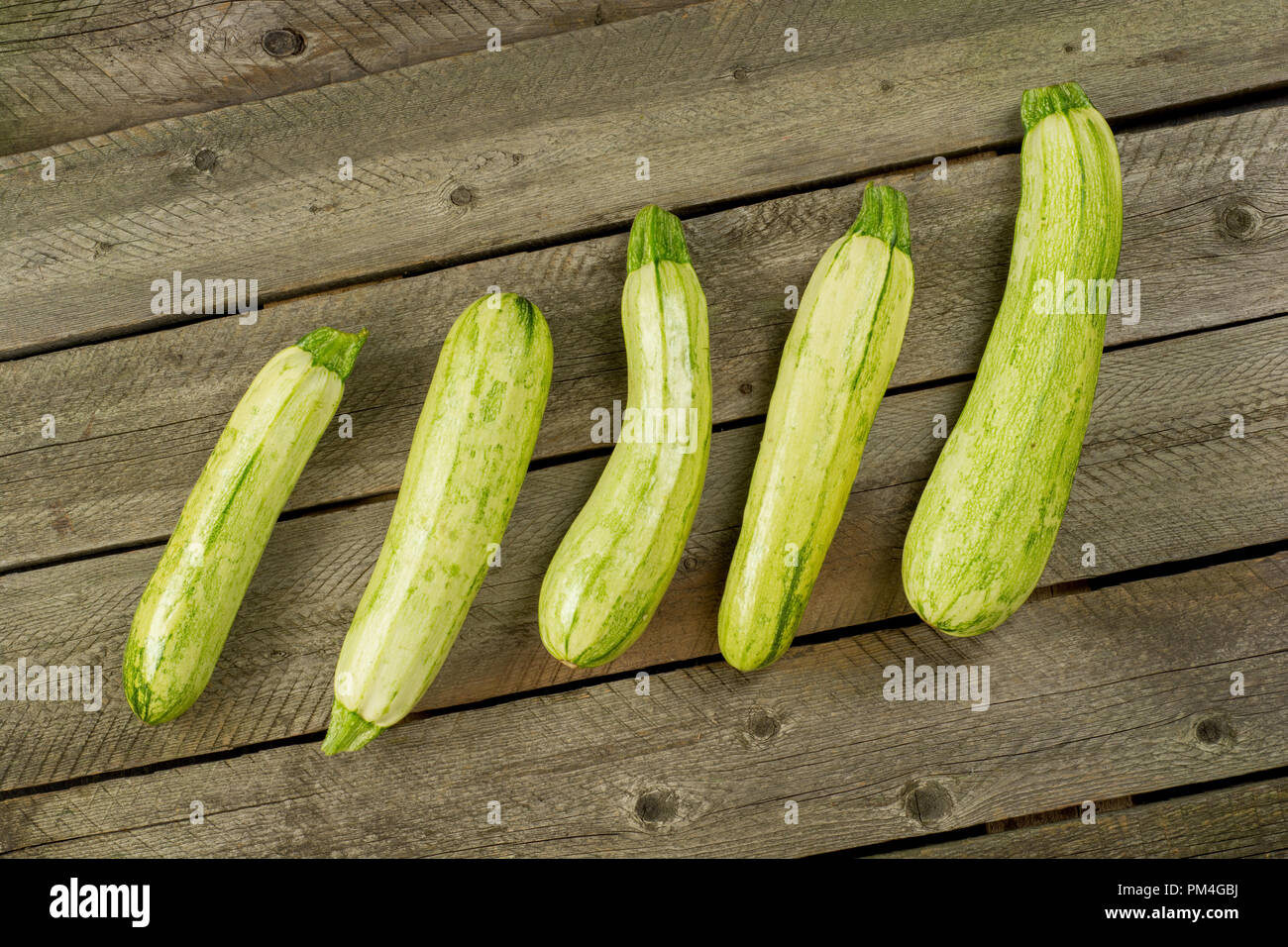 Light Green Fresh Zucchini Stacked Farm Fresh Produce Summer Vegetables On Rustic Background Top View Stock Photo Alamy