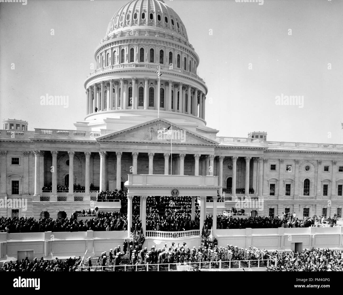 Inauguration of President John F. Kennedy on east portico of U.S. Capitol, January 20, 1961.  File Reference # 1003 084THA Stock Photo