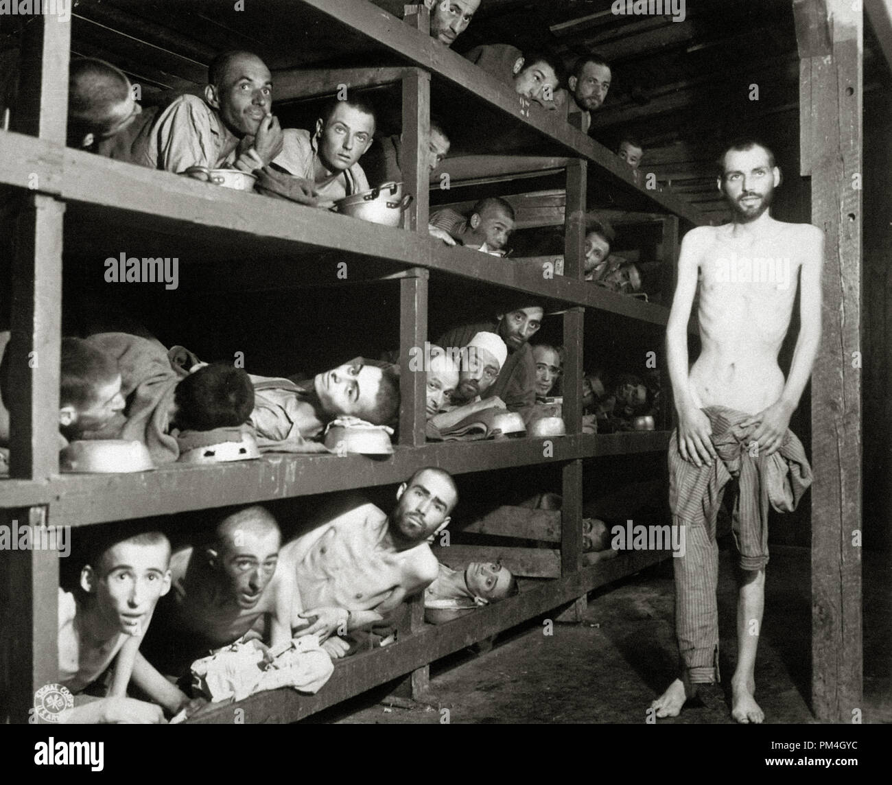 Slave laborers in the Buchenwald concentration camp near Jena; many had died from malnutrition when U.S. troops of the 80th Division entered the camp. Germany, April 16, 1945. Photo: Pvt. H. Miller. (Army)  File Reference # 1003 147THA Stock Photo