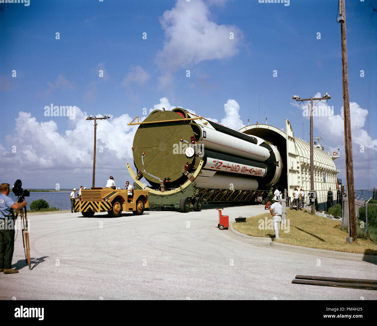 (1966) --- A stage of the uprated Saturn 1 launch vehicle unloaded from NASA barge Promise after arrival at Cape Kennedy. Launch vehicle for Apollo/Saturn 204 mission.   File Reference # 1003 186THA Stock Photo