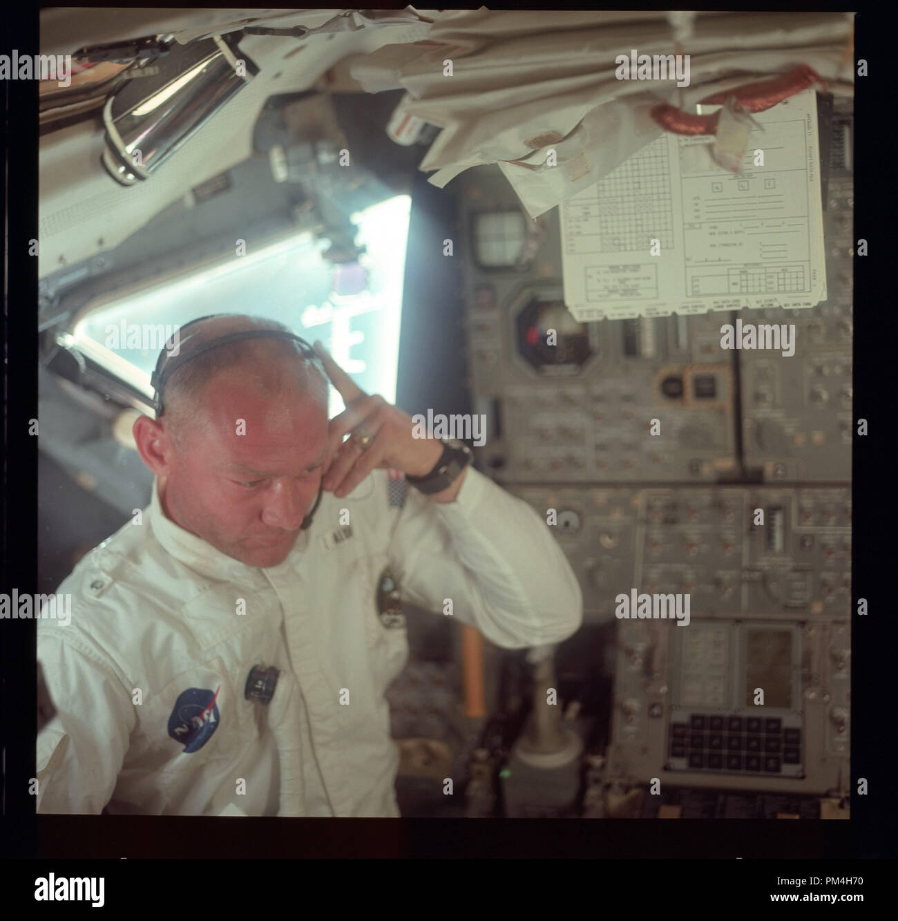 Astronaut Edwin E. Aldrin Jr. (Buzz) in Command Module during July 1969's  history making voyage to the moon and subsequent lunar landing.  File Reference # 1003 235THA Stock Photo