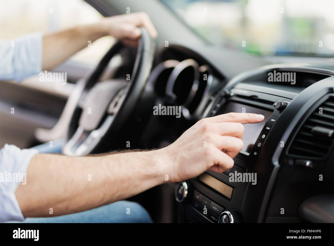 Man Using Gps Navigation System In Car Stock Photo