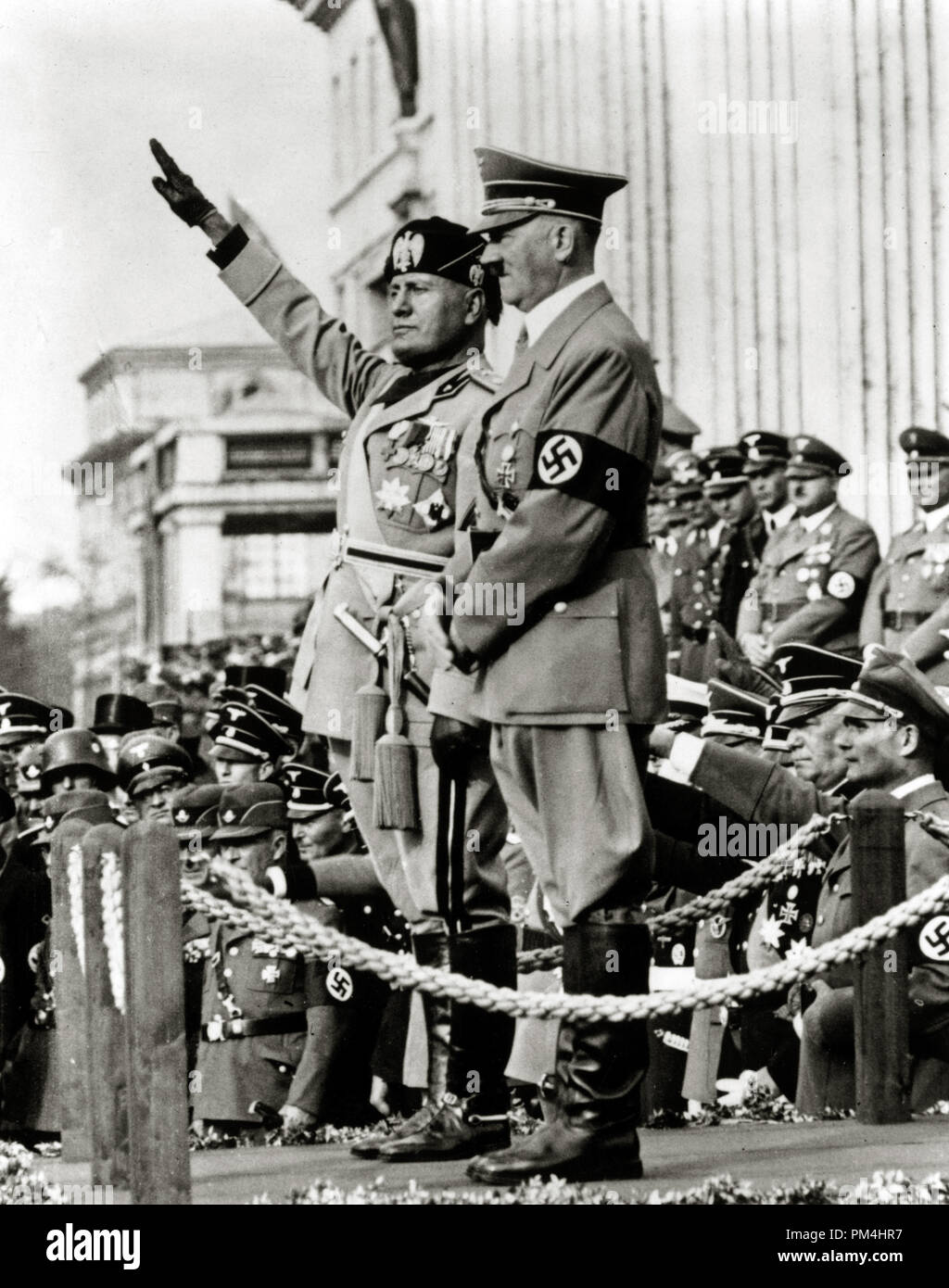 Italian dictator Benito Mussolini and German dictator Adolf Hitler during a parade in Munich, Germany circa 1940.  File Reference # 1003 395THA Stock Photo