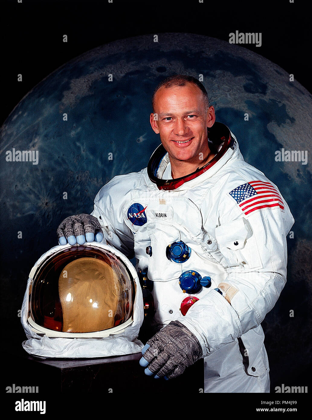 Astronaut Edwin E. Aldrin, Jr. (Buzz), July 1969. Aldrin was the second person to walk on the Moon. He was the Lunar Module Pilot on Apollo 11, the first manned lunar landing in history. He set foot on the Moon at 03:15:16 on July 21, 1969 (UTC), following mission commander Neil Armstrong.   File Reference # 1003 616THA Stock Photo