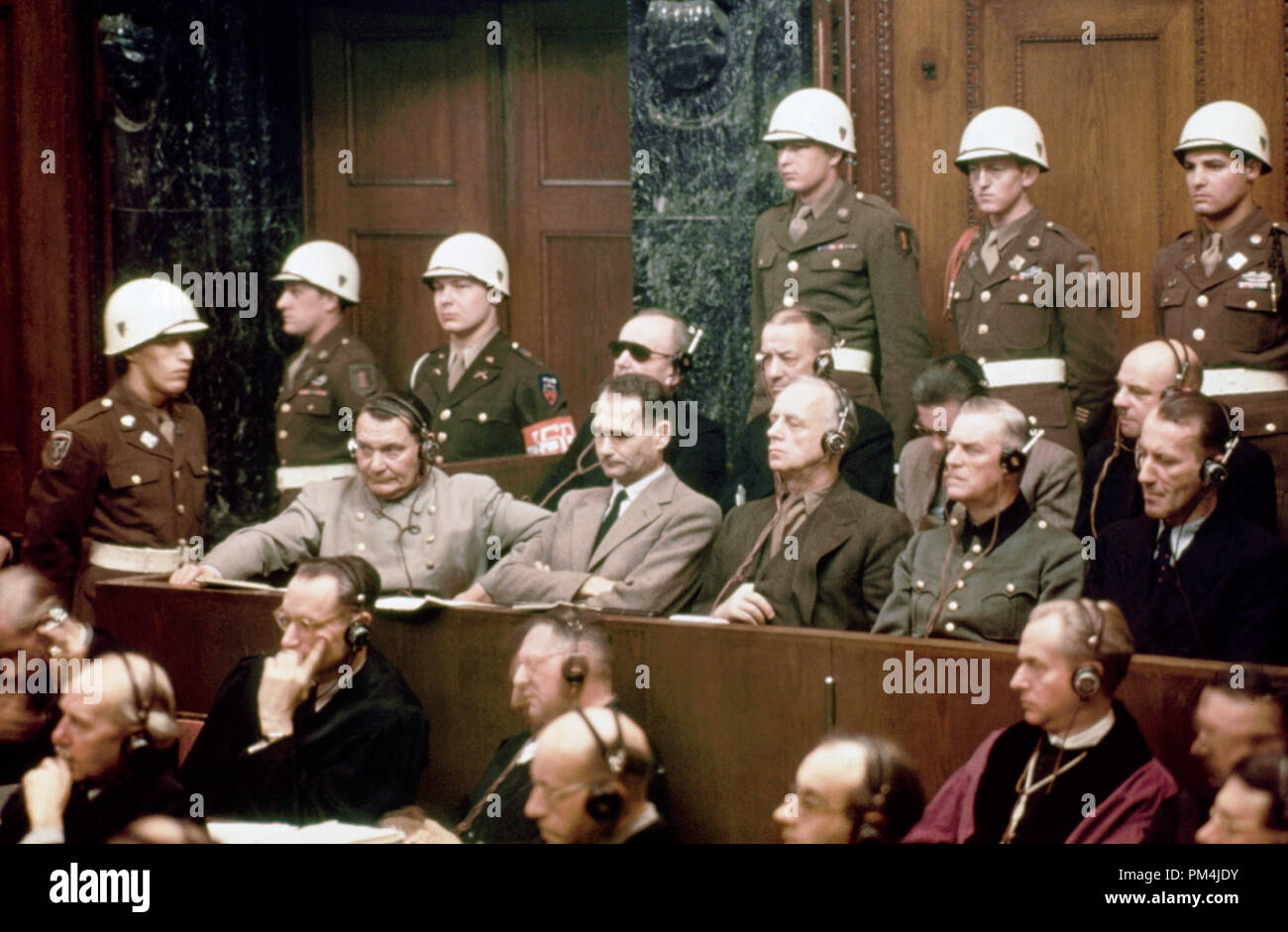 Defendants front row: Hermann Goering, Rudolf Hess,  Joachim Von Ribbentrop, Wilhelm Keitel and Ernst Kaltenbrunner. Back row: Karl Doenitz, Erich Raeder, Baldur von Schirach, and Fritz Sauckel, 1946   File Reference # 1003 684THA Stock Photo