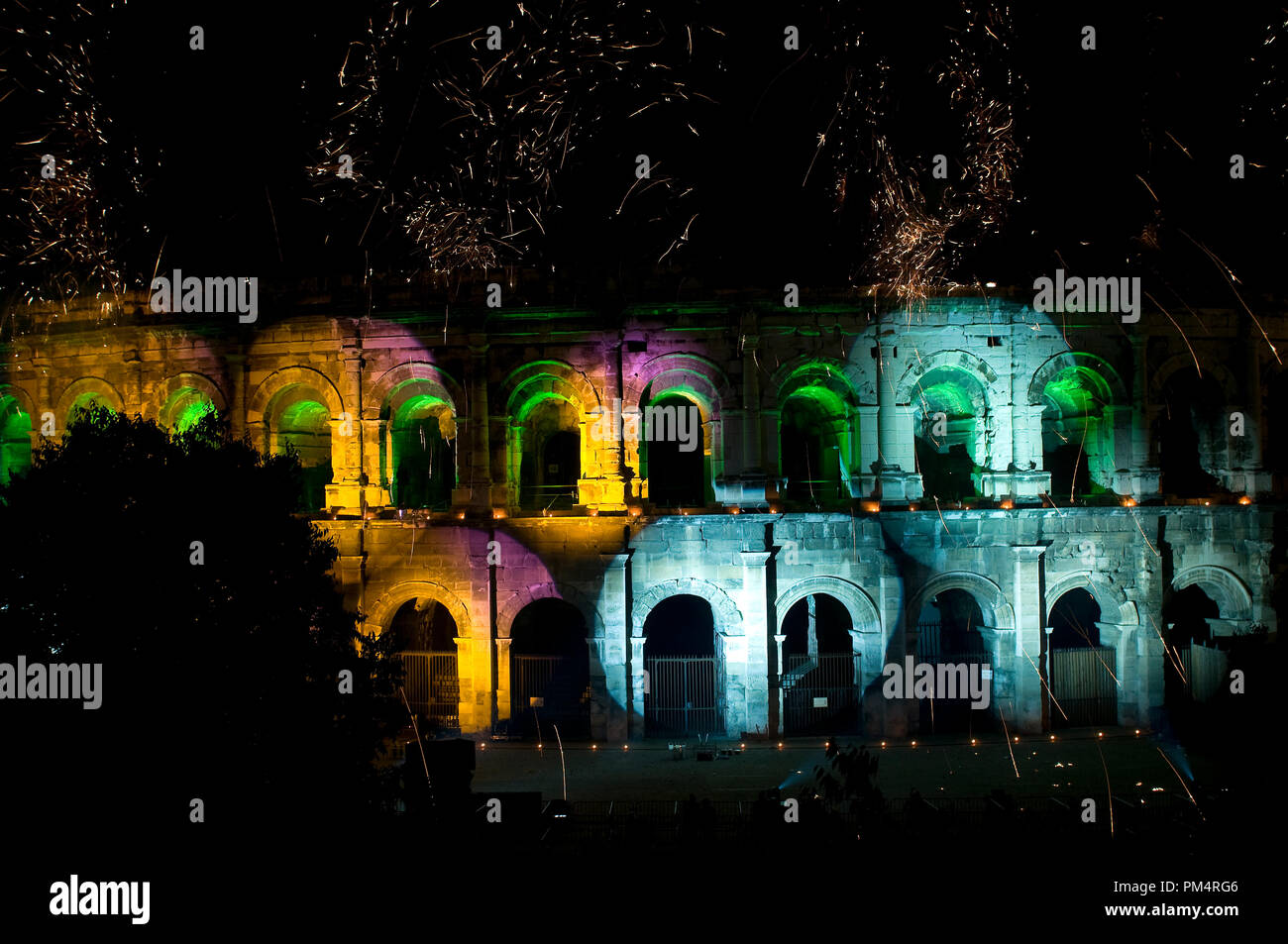 France - Gard (30) Arenas of Nimes - Gard (30) - Fireworks and set of lights for the 14 july Stock Photo