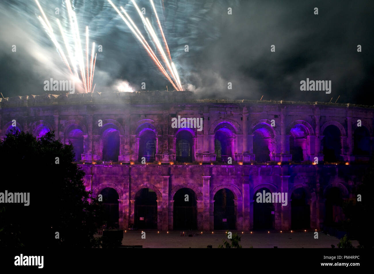 France - Gard (30) Arenas of Nimes - Gard (30) - Fireworks and set of lights for the 14 july Stock Photo