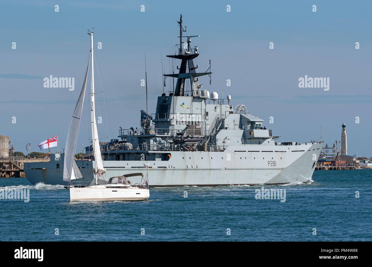 HMS Tyne departing Portsmouth Harbour to patrol the offshore fishing areas  of the English Channel. Stock Photo