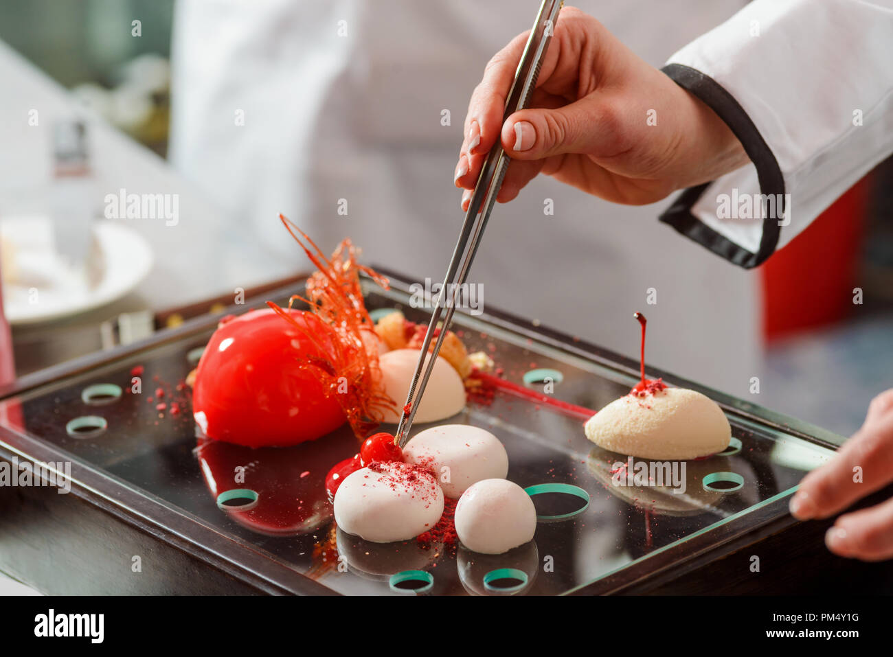Cherry, yogurt spheres and cake Stock Photo Alamy