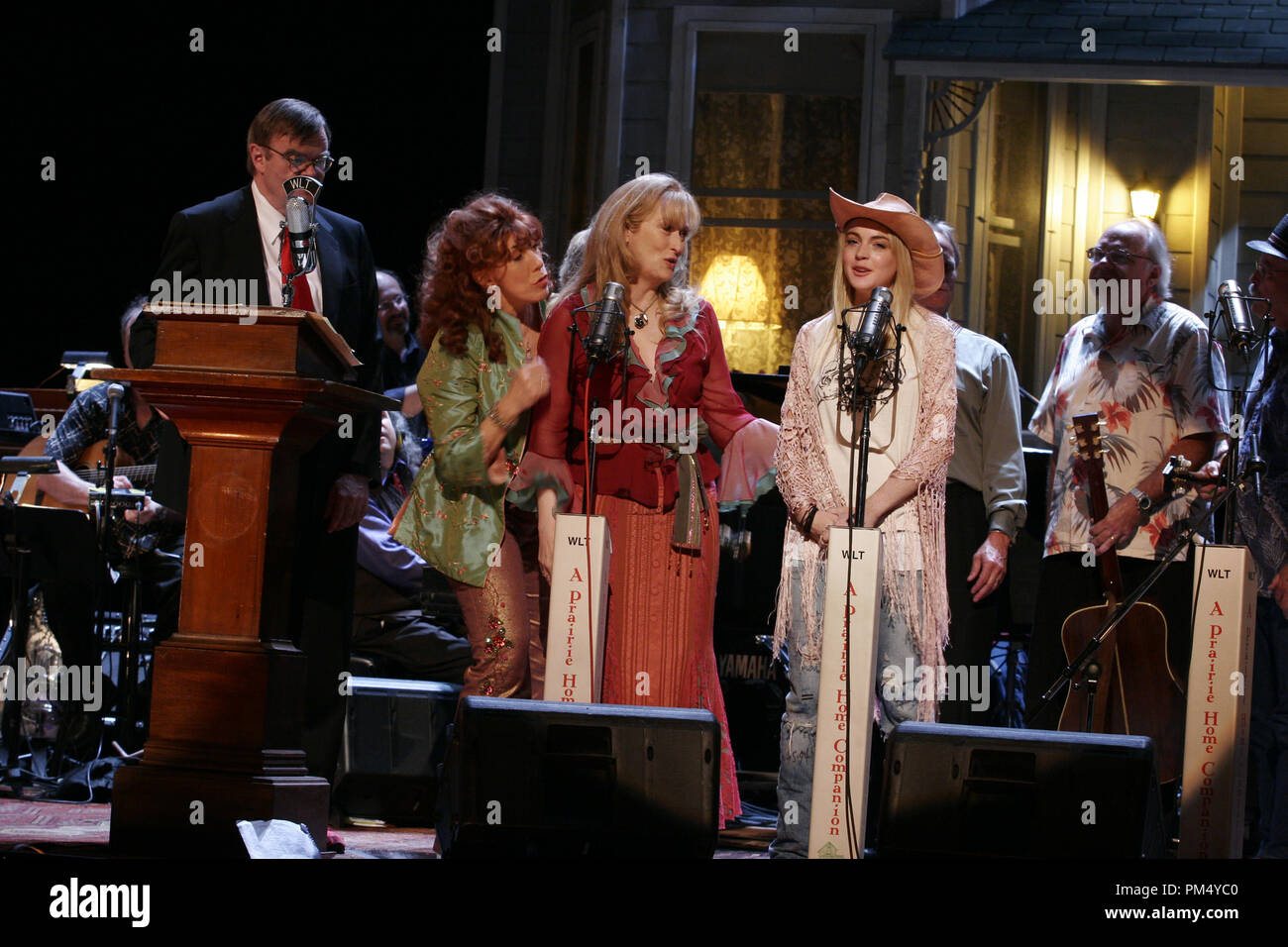 Film Still / Publicity Still from 'A Prairie Home Companion' Garrison Keillor, Lily Tomlin, Meryl Streep, Lindsay Lohan © 2006 Picturehouse Photo Credit: Melinda Sue Gordon  File Reference # 30737352THA  For Editorial Use Only -  All Rights Reserved Stock Photo