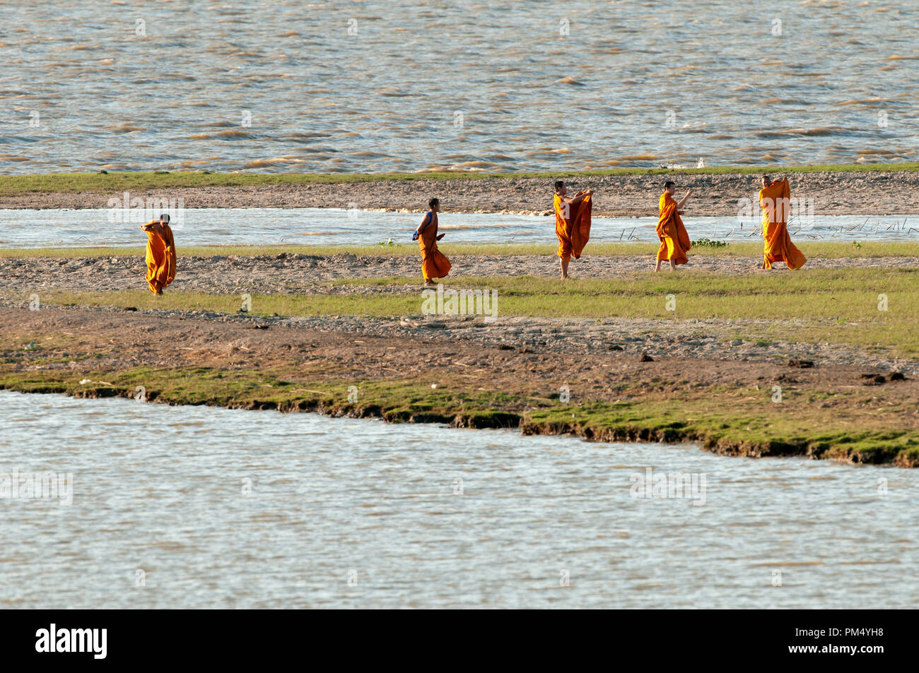 Monks visiting Tale Noi - Between lake and sea - Patthalung - Thailand Stock Photo