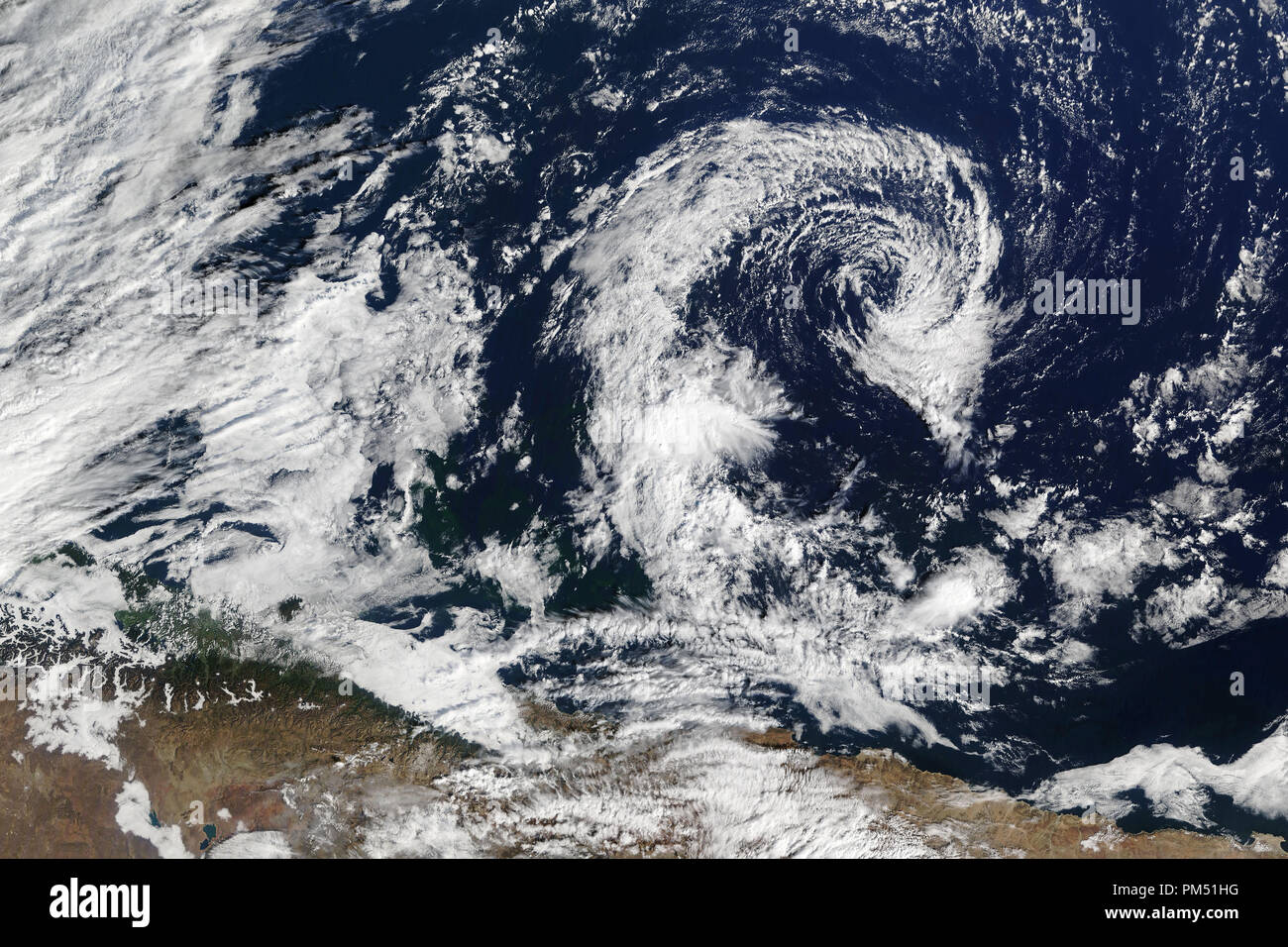 Satellite view of huge cyclone. Elements of this image furnished by NASA. Stock Photo