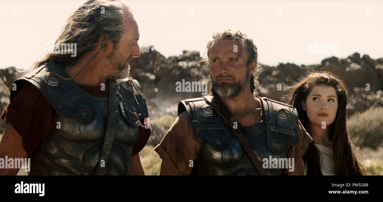 (L-r) LIAM CUNNINGHAM as Solon, MADS MIKKELSEN as Draco and GEMMA ARTERTON as Io in Warner Bros. Pictures’ and Legendary Pictures’ “Clash of the Titans,” distributed by Warner Bros. Pictures. Stock Photo