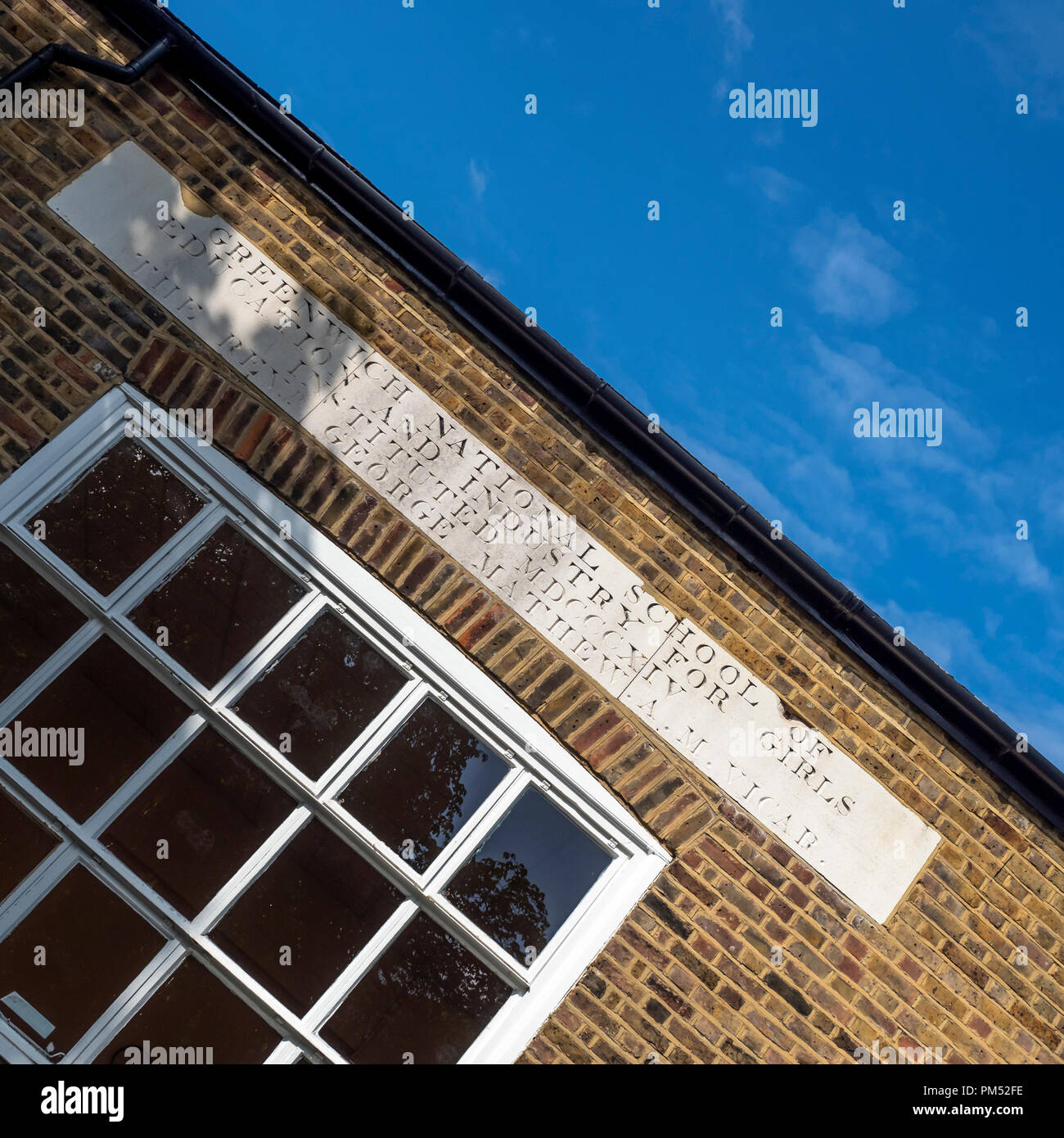 LONDON, UK - AUGUST 25, 2018:  Sign above Victorian Building that was a Girls Schoo  in Greenwich Stock Photo