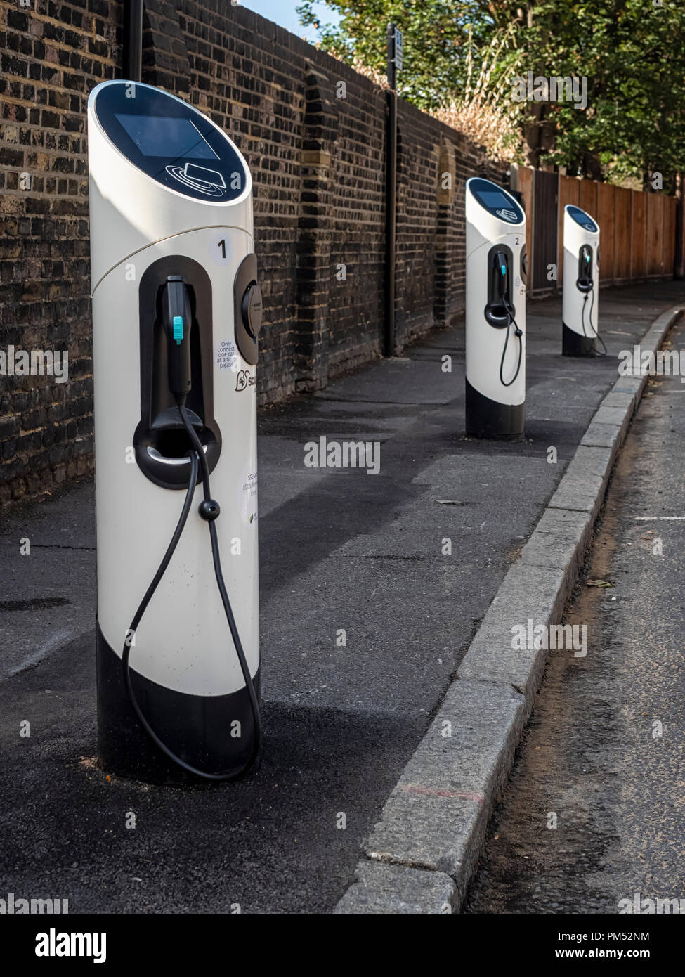Row of electric car charging points hires stock photography and images