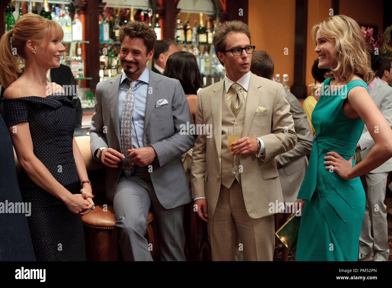 Left to right: Pepper Potts (Gwyneth Paltrow), Tony Stark (Robert ...