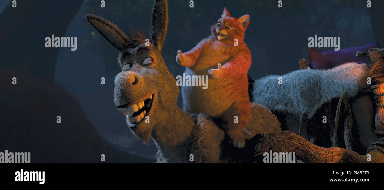 Donkey (EDDIE MURPHY) and Puss In Boots (ANTONIO BANDERAS) share a laugh in  DreamWorks Animation's "Shrek Forever After Stock Photo - Alamy