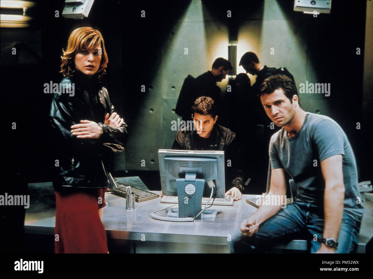 Resident Evil Milla Jovovich, Martin Crewes, James Purefoy © 2002 Sony Pictures Photo by Rolf Konow Stock Photo