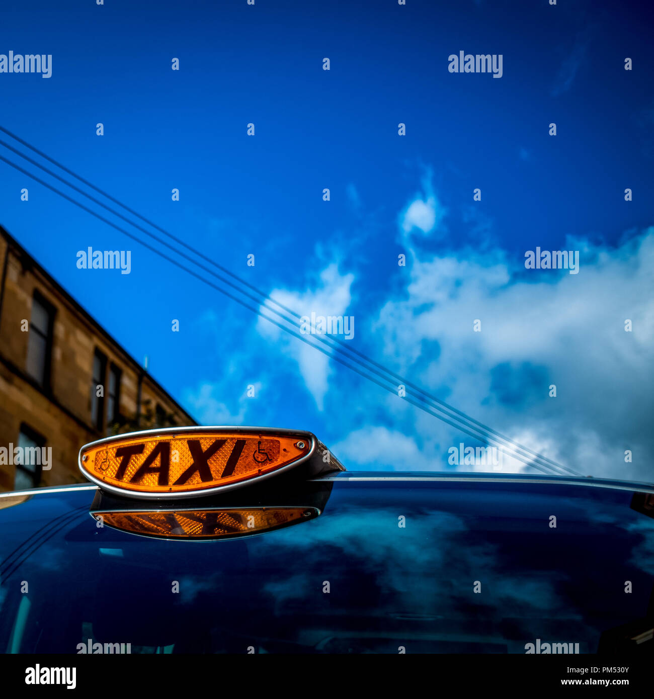 Close-up of a Taxi Light on a Cab in Glasgow, Scotland, UK Stock Photo