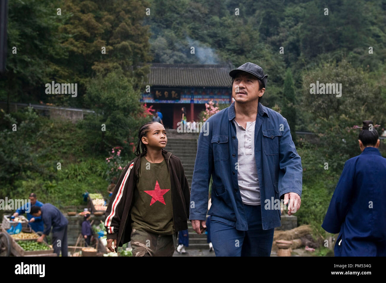 Jaden Smith as 'Dre Parker' and Jackie Chan as 'Mr. Han' in Columbia Pictures' THE KARATE KID. Stock Photo