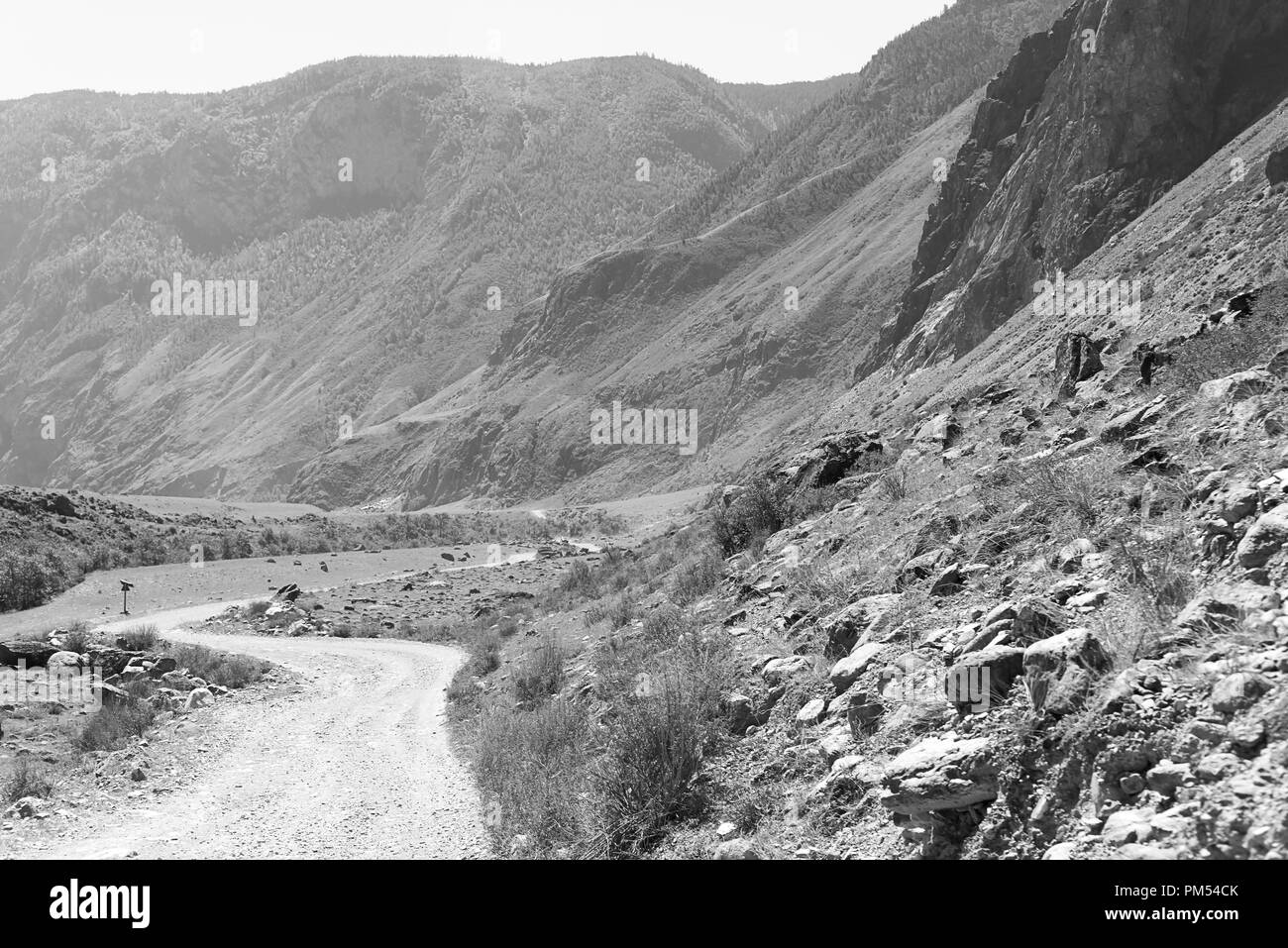 Black-and-white picture of the mountain wild road of Altai Stock Photo