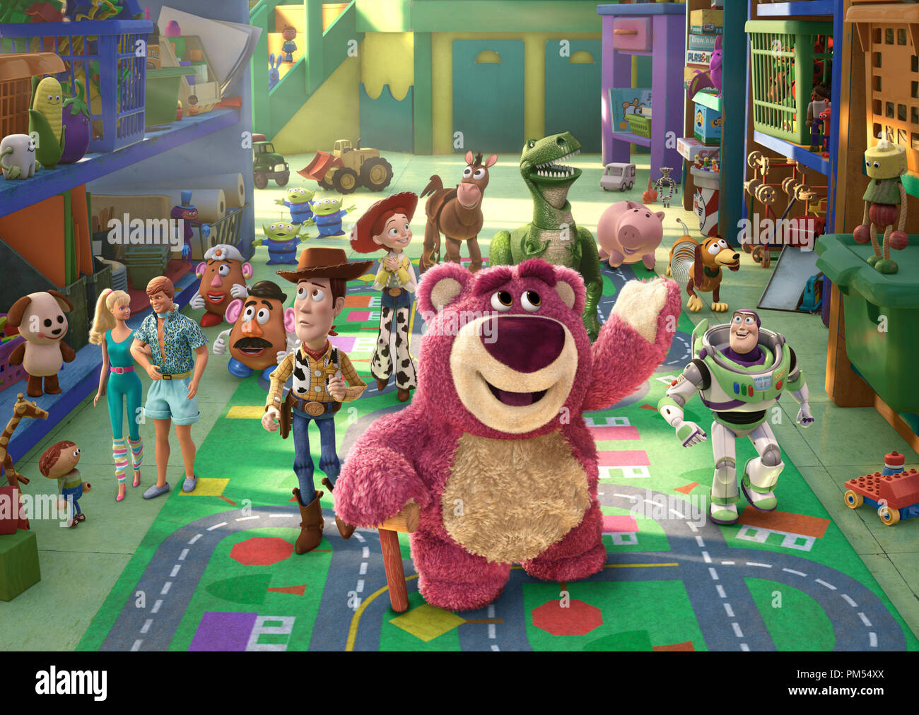 TOY STORY 3   (L-R) Barbie, Ken, Mrs. Potato Head, Mr. Potato Head, Aliens, Woody, Jessie, Bullseye, Lots-o-Huggin Bear, Rex, Hamm, Slinky Dog, Buzz Lightyear   © Disney/Pixar.  All Rights Reserved. Stock Photo