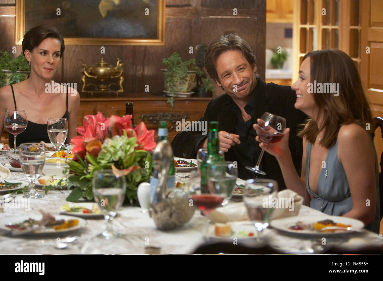 Embeth Davidtz as Felicia Koons, David Duchovny as Hank, and Diane Farr as Jill Robinson in Californication (Season 3, Episode 1) Stock Photo