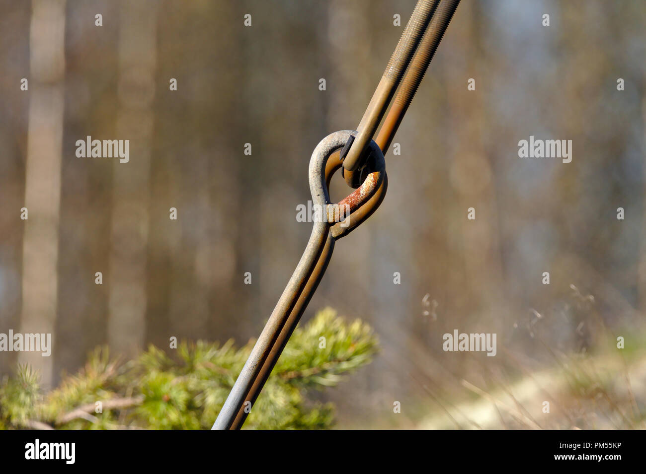 A strong steele connection rod holding up the tower of power lines ...